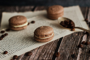 Macaroons. Delicious french dessert. Romantic composition with coffee and other elements.