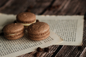 Macaroons. Delicious french dessert. Romantic composition with coffee and other elements.