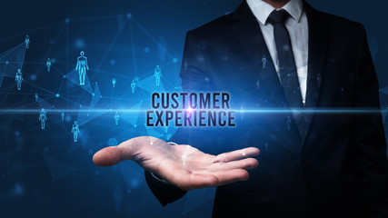 Elegant hand holding CUSTOMER EXPERIENCE inscription, social networking concept