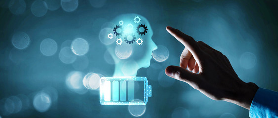 Human head with gear and battery charging business process brainstorming