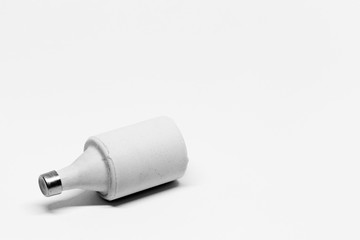 a ceramic electrical plug on white background