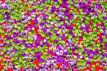 Texture. Spiders on a red background. The view from the top.