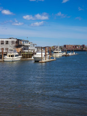Fototapeta na wymiar Long Wharf with Customhouse Block and sailboats Boston