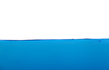 Obraz premium Blue water surface with bubble and water splash on white background