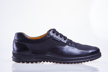 man leather shoes isolated on white backgrounf