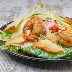 shrimp salad with greens and croutons
