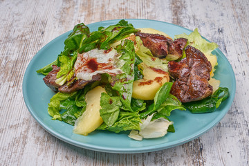 chicken kidney warm salad with greens and avocado