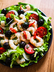 Prawn salad on black stone board