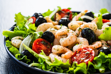 Prawn salad on black stone board