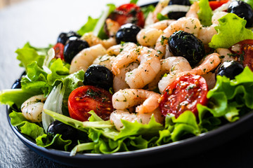 Prawn salad on black stone board