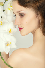 Obraz na płótnie Canvas face with orchids