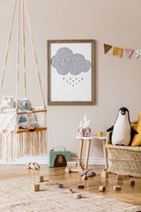 Stylish scandinavian interior of kid room with mock up poster frame, design furnitures, natural...
