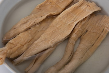 The dried bamboo shoots made of delicious bamboo shoots are on the white background