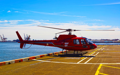 Helicopter on the helipad in Lower Manhattan in New York reflex