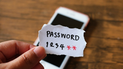 Easy Password concept. password 1234*** written on a paper with marker.