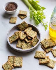 Healthy Snack from Wholegrain Rye Crispbread Crackers with spinach and flaxseed and olive oil