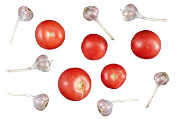 Set of tomatos and garlic. Orange tomato and garlic at white isolated background.