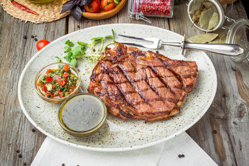 Tenderloin steak on plate with sauce