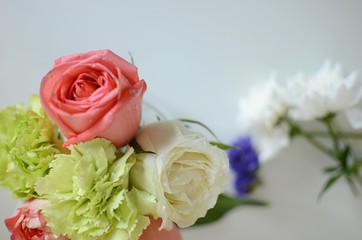 Beautiful Flowers on a white Table, Background