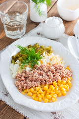 Homemade salad with canned tuna and corn, selective focus