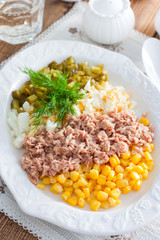 Homemade salad with canned tuna and corn, selective focus