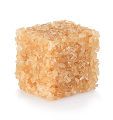 Brown sugar close-up isolated on white background.