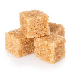 Brown sugar close-up isolated on white background.