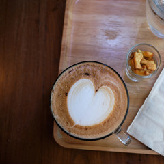 cup off hot coffee on table closeup