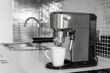 Close-up of making coffee in a coffee machine.