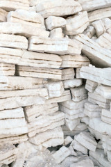 Wall of chunks of dirty city snow close-up