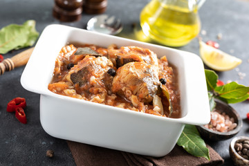 Hake fish, cooked in tomato sauce with vegetables and spices