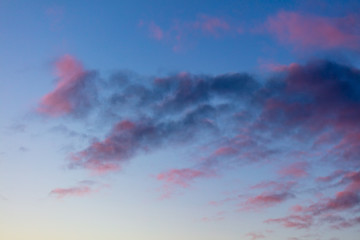 Pink dawn in the sky with clouds