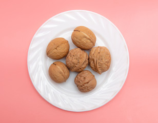 Walnuts in a white plate