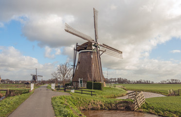 Windmill Achtkante Molen is a wooden octagonal thatched windmill in the Dutch village of...