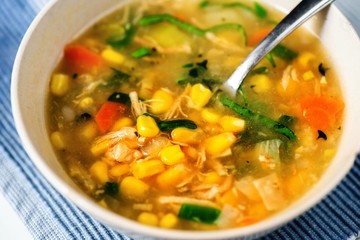 Rich corn soup with chicken meat .