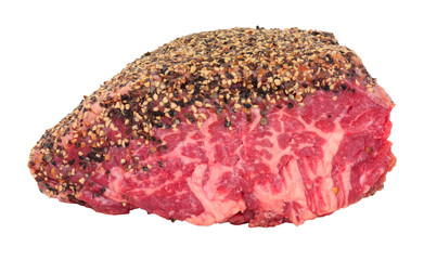 Raw pepper and salt covered beef rump joint also known as a picanha cut and sirloin cap meat cut isolated on a white background