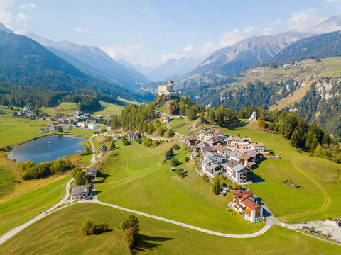 Aerial view of Castle Tarasp (built in the 11th century) in Swiss Alps, Canton Grisons or Graubuendon, Switzerland