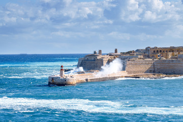 Castle on coast of sea. Kalkara, Malta.