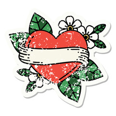 traditional distressed sticker tattoo of a heart and banner