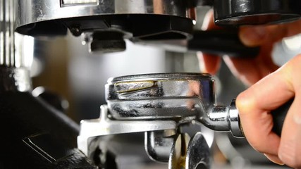 Barista making coffee , Making latte art coffee .