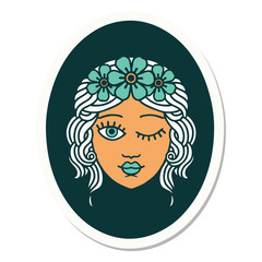 tattoo style sticker of a maiden with crown of flowers winking