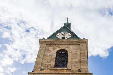 The upper part wit hthe clock of the famous Clock Tower in old Yafo in Israel