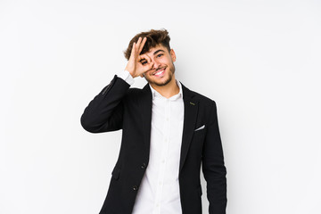 Fototapeta premium Young arabian business man isolated excited keeping ok gesture on eye.