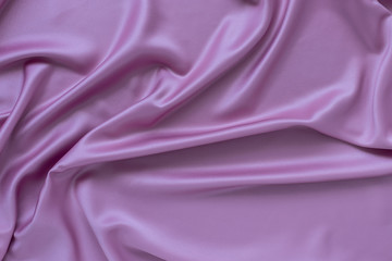 purple silk fabric, soft waves on the surface. luxury style background.