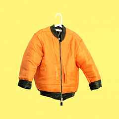 Contemporary art collage. Hipster bomber jacket at hanger. Fashion minimal concept
