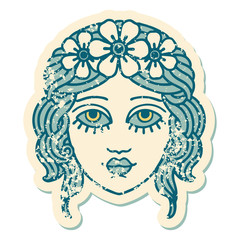 distressed sticker tattoo style icon of female face with crown of flowers