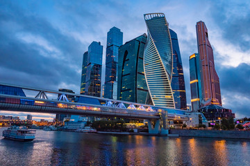 Fototapeta na wymiar Moscow. Russia. Moskva-city. Complex of skyscrapers in the center of the capital of Russia. Bridge over the Moscow river. Evening in the capital of the Russian Federation. Modern urban architecture.