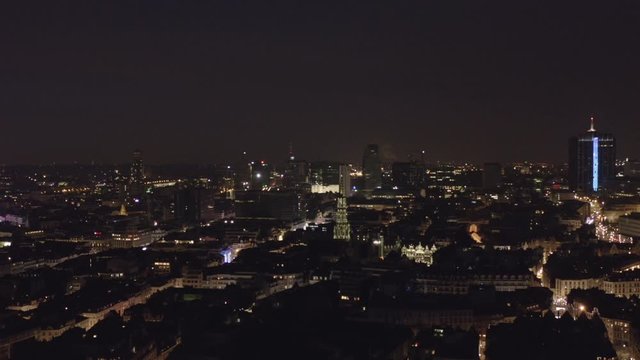 Brussels Belgium Aerial v30 Flying over Stalingrad district and Grand Place square with downtown cityscape views at dusk night - December 2019
