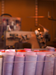 Threads for sewing are in a plastic box in the Studio