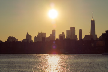 Lower Manhattan Skyline on the East River in New York City during Sunset